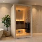 Finse sauna S-Line Nordiq 110 in een lichte badkamer met natuursteen